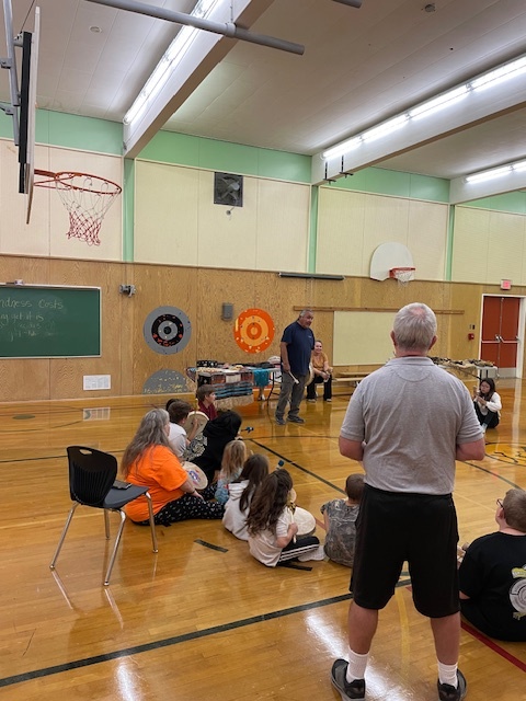 Drumming and singing the honor song todd routtu